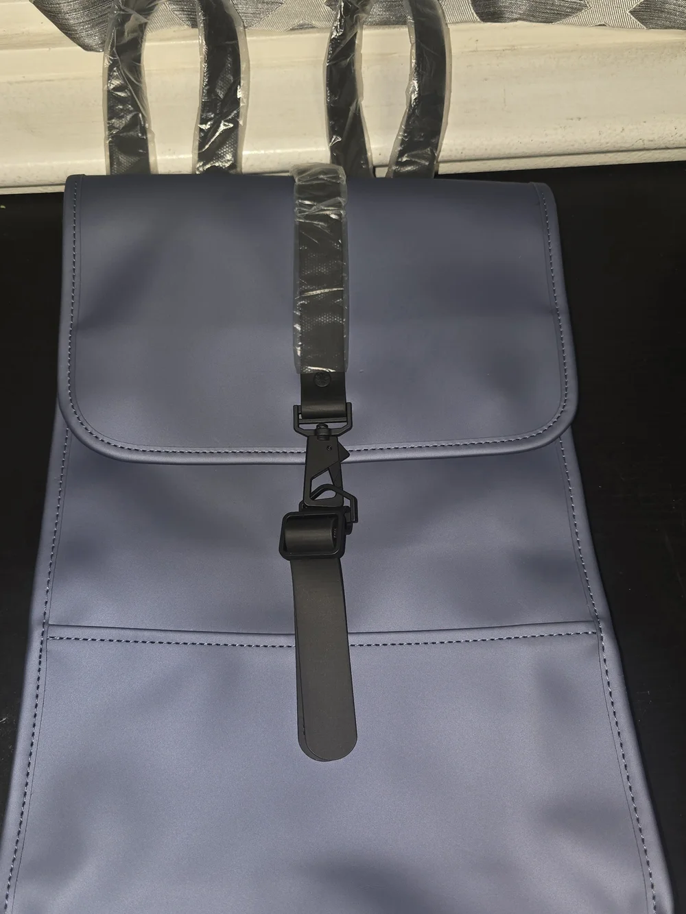Rains Matte Blue Minimalist Backpack